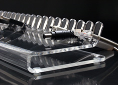 Fingers Notebook Stand Also Manages Your Cables
