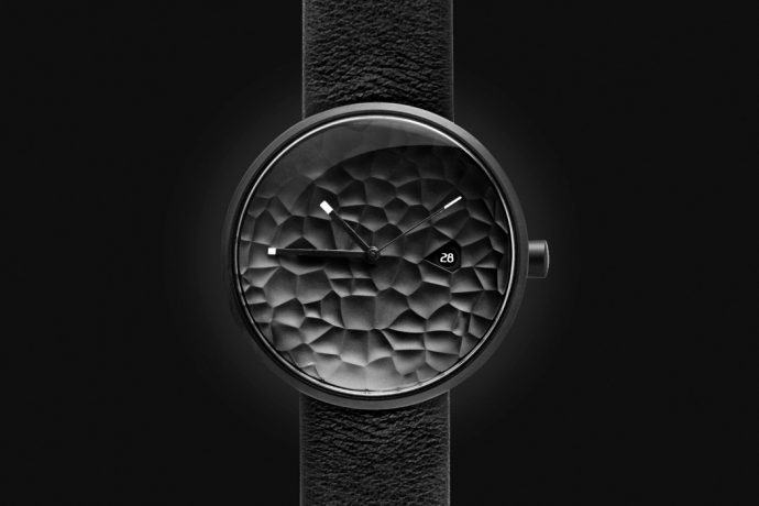 This textured watch-face breaks the monotony of minimalist watch design