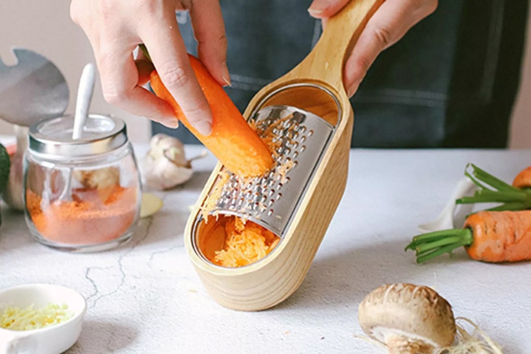 This elegant grater comes with its own wood container, and I can't