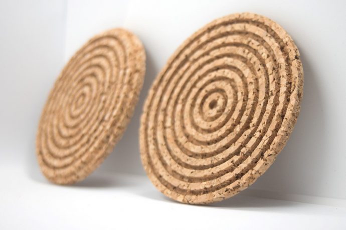 These grooved cork discs act as coasters as well as air-tight container-lids