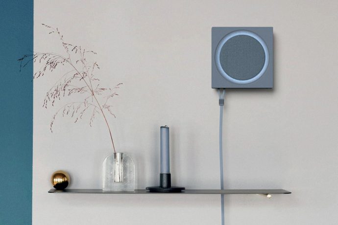 A wall-mounted router that keeps your signal amplified and you organized