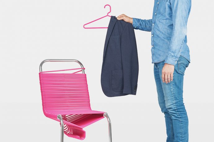 The Coat Check Chair gives you a seat, as well as a lifetime supply of hangers!