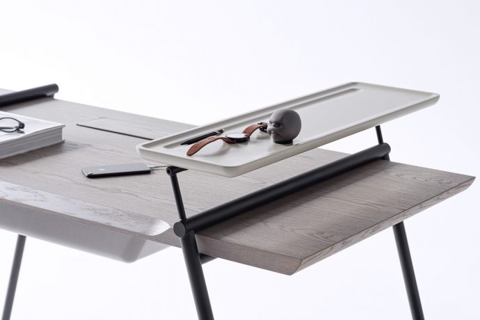 This desk has an assistant desk stacked on top, to hold more stuff for you