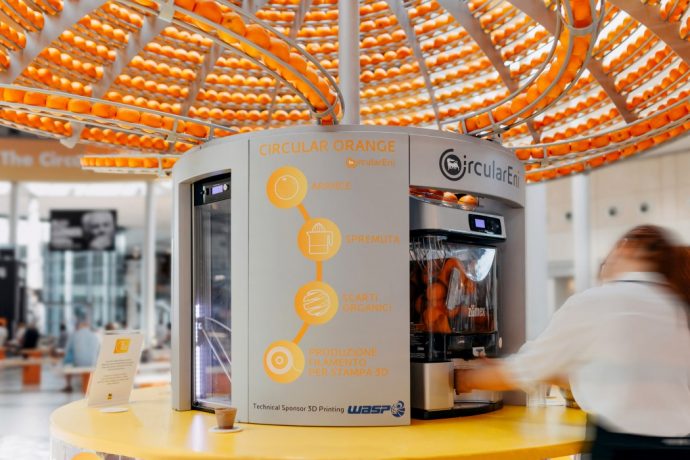 Carlo Ratti’s Orange Juice Machine serves OJ in cups made from 3D printed orange peels
