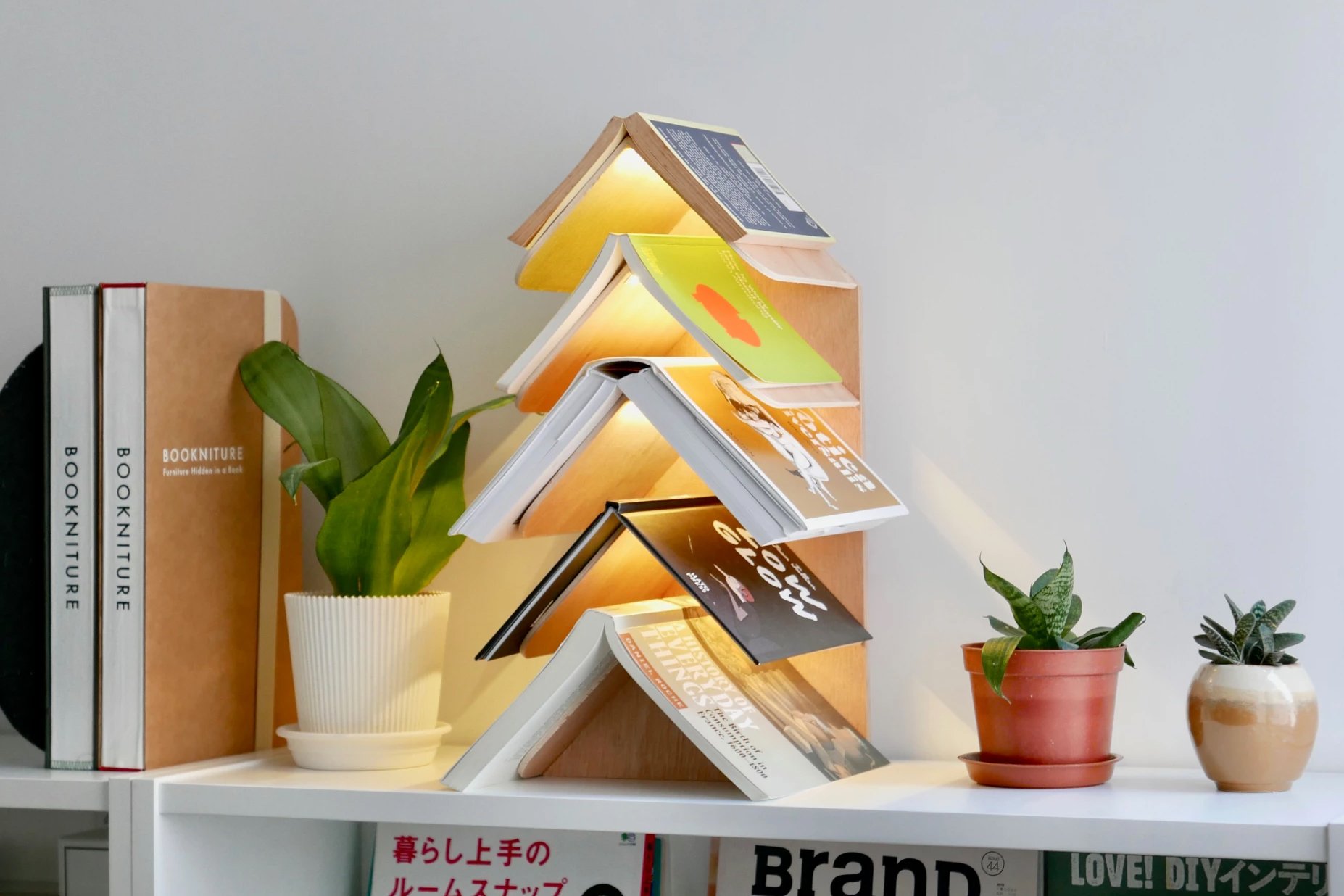 Meet The Wisdom Tree A Bookshelf That Looks Like A Christmas Tree