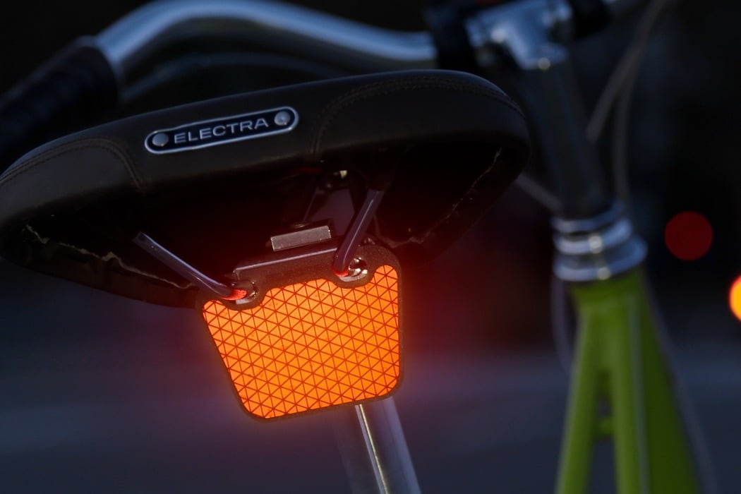 This clip-on reflector with microprismatic film instantly makes night  riding safer - Yanko Design