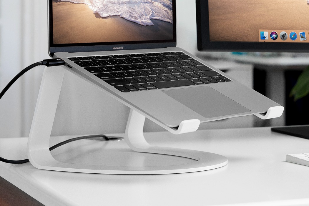 Stoel segment Compliment This innovative curvy stand for the MacBook cantilevers it beautifully,  like the new iPad Pro - Yanko Design