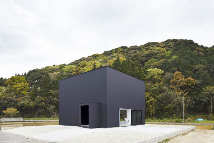 A minimal black iron loft adds a modern element to this Japanese town