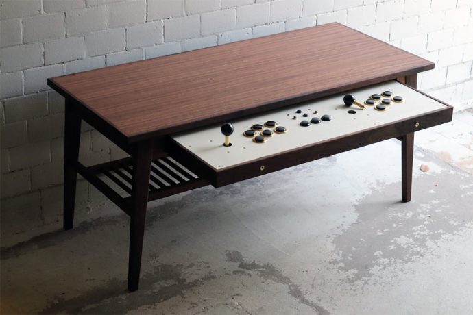 This retro coffee table transforming into a gaming console is peak modern furniture