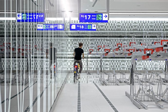 This museum-inspired bicycle garage pushes the boundaries of urban mobility!