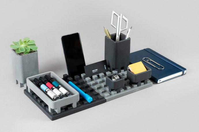 LEGO-inspired concrete organizer is modular, holds your belongings, and even docks your phone!