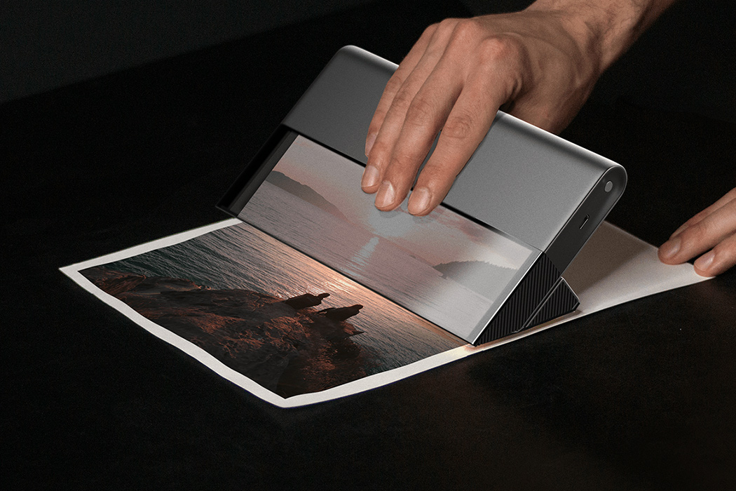 Gentagen synder terrorisme This handheld portable printer + scanner seamlessly prints on any flat  surface! - Yanko Design