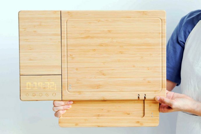 This smart sustainable kitchen cutting board has 10 features including a 99.99% germ-killing UVC light!