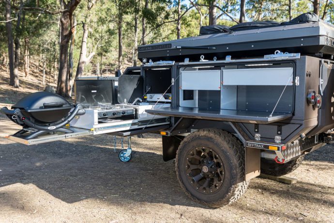 This off-grid trailer expands to include an outdoor shower and a MasterChef worthy kitchen