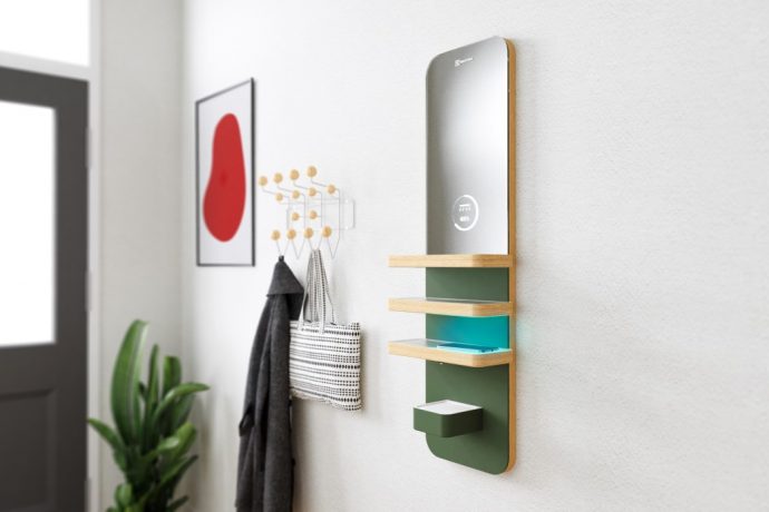 Electrolux + UID design students create a hallway shelf that sanitizes your phone and hands
