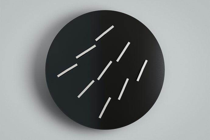 This analog clock + kinetic sculpture uses automated choreography to tell time!