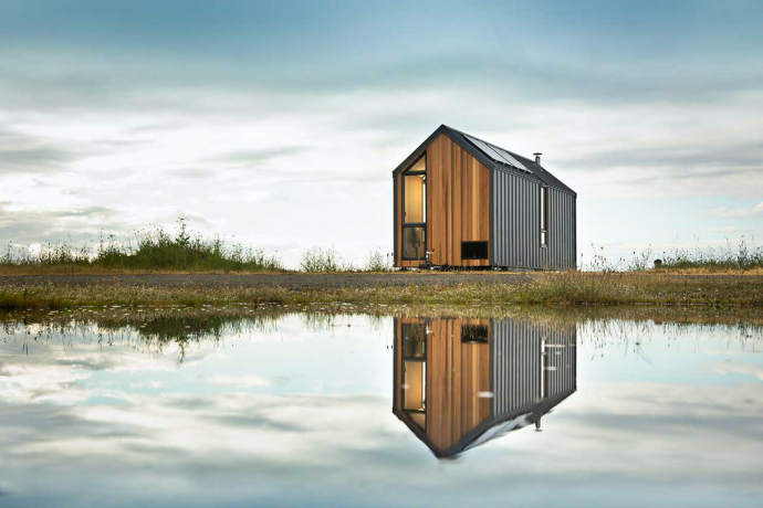 This tiny, prefabricated home travels with you from the coastlines to the mountain tops!