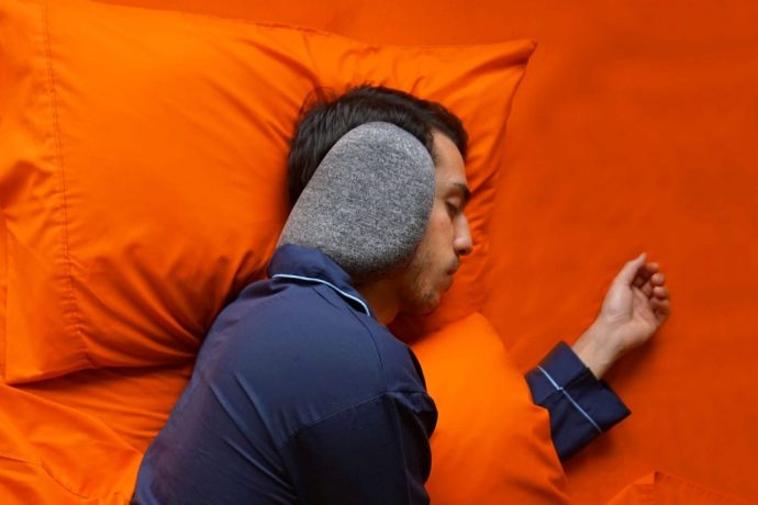 This earmuff neck-pillow blocks sound more efficiently than most noise-canceling headphones