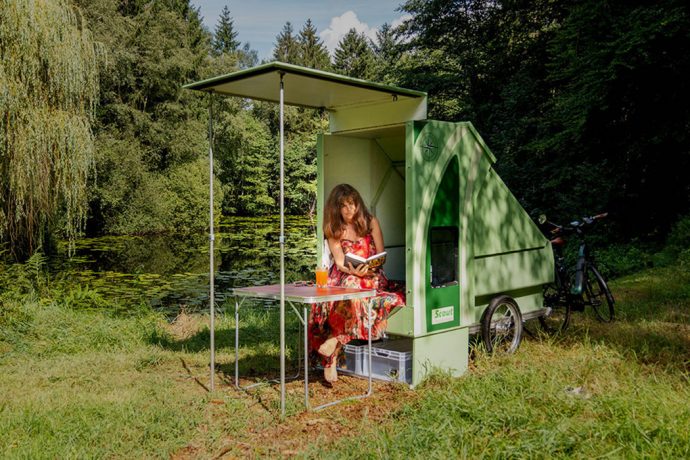 This Foldable trailer for your e-bike instantly converts into a one-person overnight camping adventure!