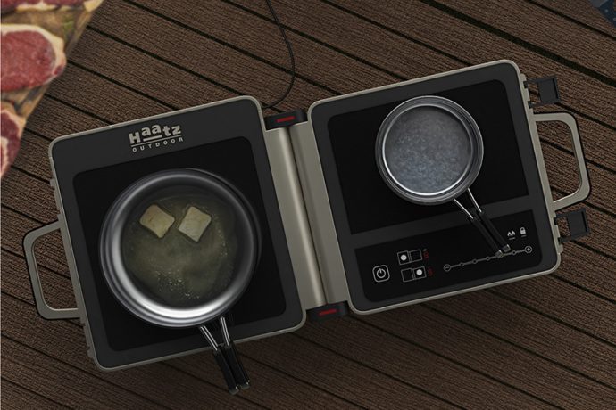 This foldable dual stovetop works in double time to save space and provide a full meal while camping!