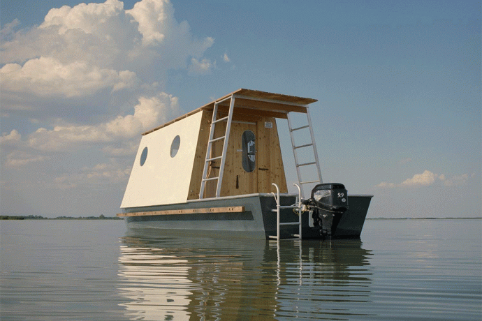 This houseboat was designed to blend in the natural landscape & encourage sustainable travel