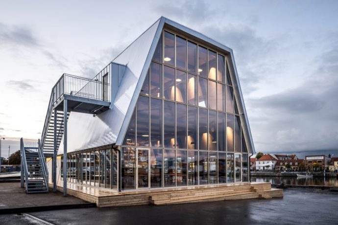 This reusable taphouse in Denmark was designed to be moved and rebuilt for future buildings