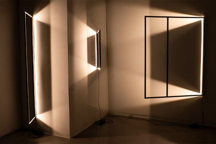 These window-like lighting fixtures create playful geometric light displays when opened!
