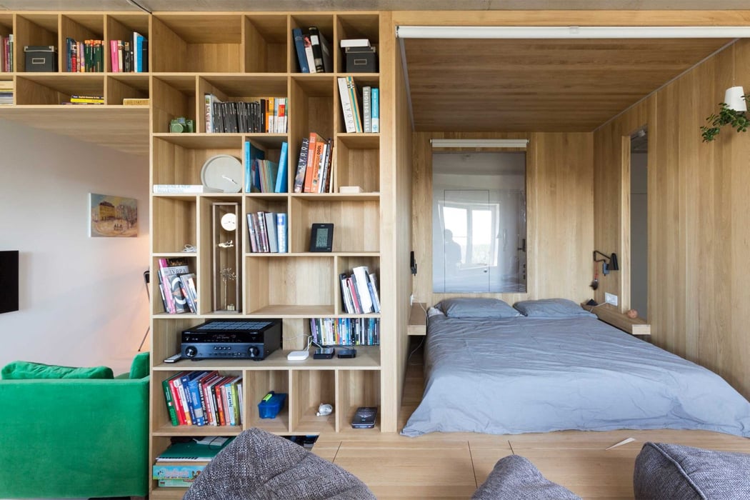 A Multifunctional wooden 'bedroom box' creates a whole new room