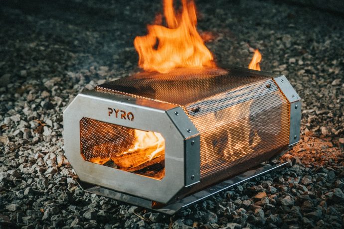 This outdoor fire pit + flexible grill is the perfect accessory to elevate your camping trip!