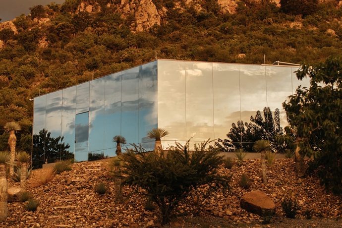 This sustainable mirrored cabin has a special ultraviolet coating that helps avoid bird accidents!
