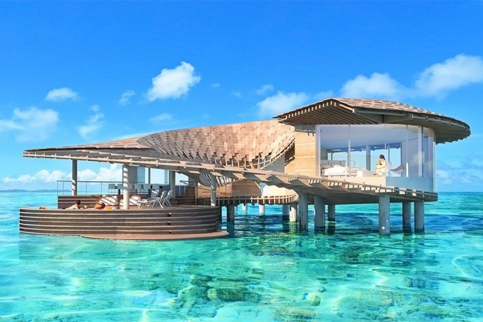 This solar-powered luxury resort has 100 sustainably designed villas spread over 90 islands that boost eco-toursim!