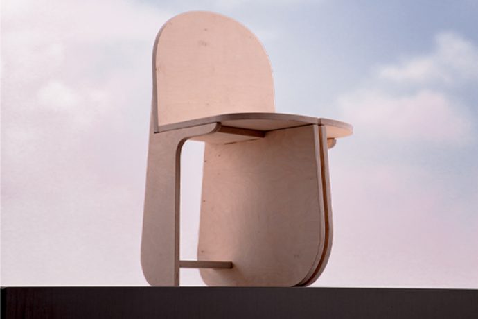This flat-pack chair is supported by three rounded legs and requires no tools for assembly!
