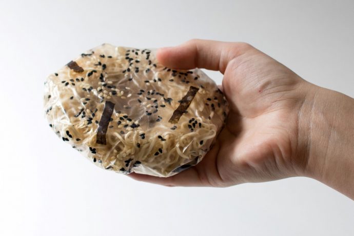 This instant noodle’s water-soluble packaging becomes its sauce!