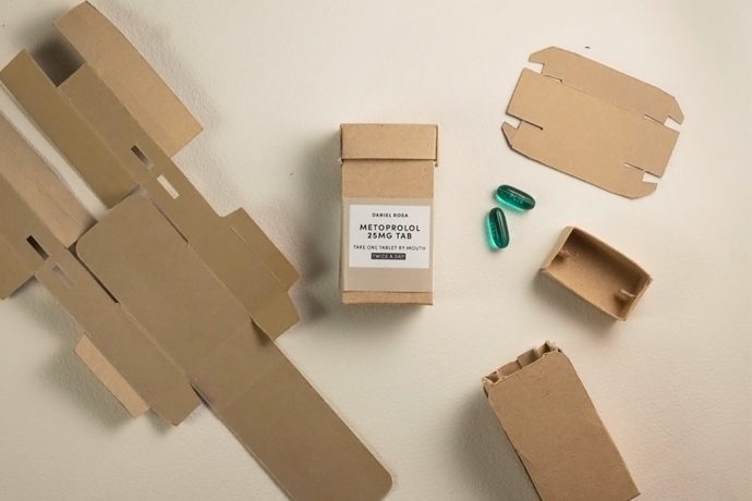 This biodegradable prescription pill bottle is an open-source design made from paper & its child-proof!