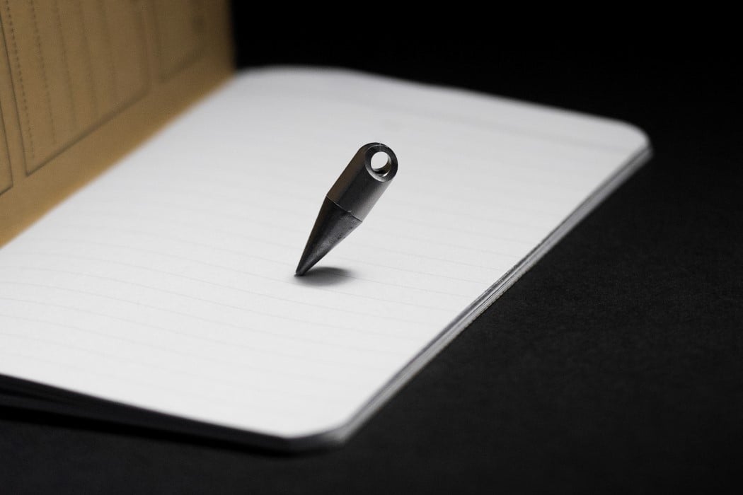 This tiny inkless pen is made from a special metal alloy that can literally  write forever - Yanko Design