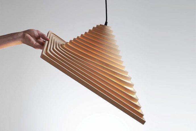 This flatpack origami-inspired product unfolds into a layered lamp for a modern yet space-saving light design!