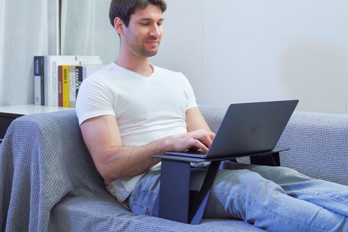 This paper-thin laptop desk comes with 6 configurations to work from your office + bed!