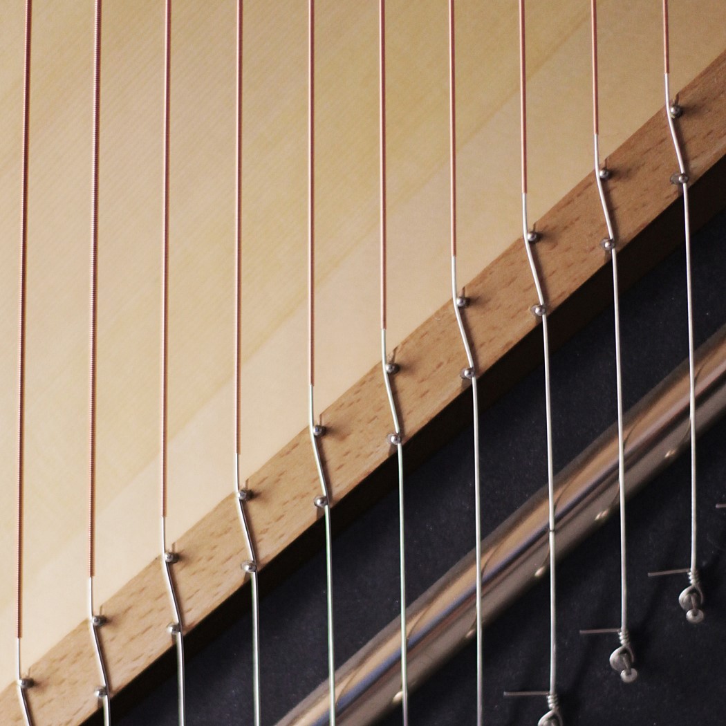 The Una Corda is an award-winning 'nude' upright piano that shows you the  magic underneath the hood - Yanko Design