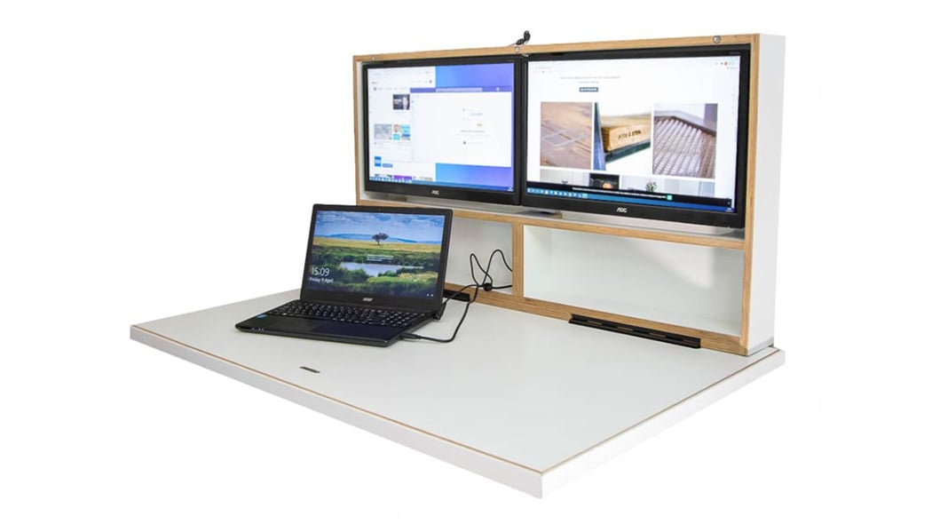 Discover the stylish and functional wall-mounted workstation and folding desk by Pith & Stem. Achieve a healthy work-life balance and boost productivity in your home office. Order now!