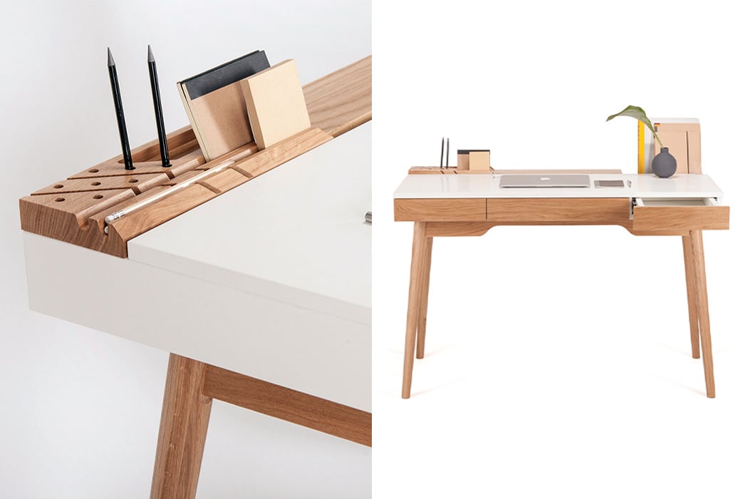This home office desk comes with hidden storage systems to keep your desk setup organized!