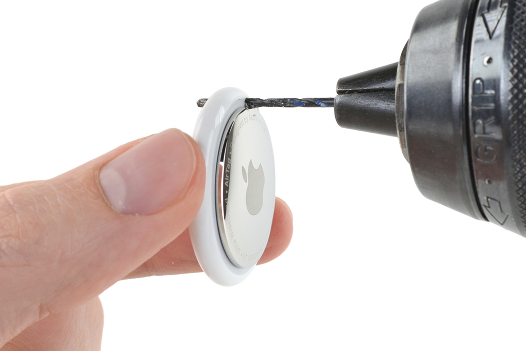 Your Apple AirTag meets a drill to create a keyring hole with this