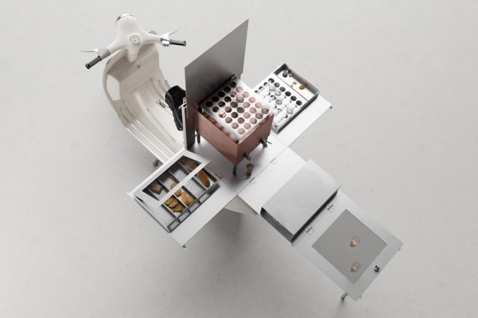 This tiny tea café fits in a 1.5 sq. ft. fold-out box on the back of a Vespa
