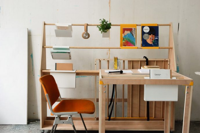 This modular office desk transforms into a minimal hanging display when not in use