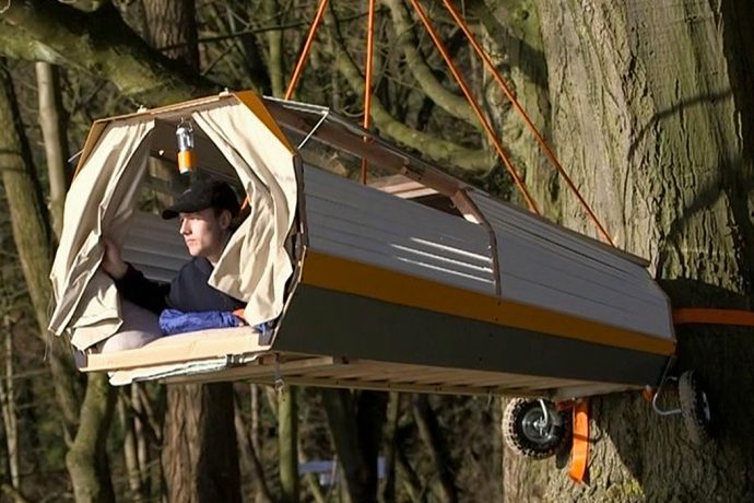 This portable treehouse trailer hooks onto a bike, making it the ultimate solo outdoor escapade!