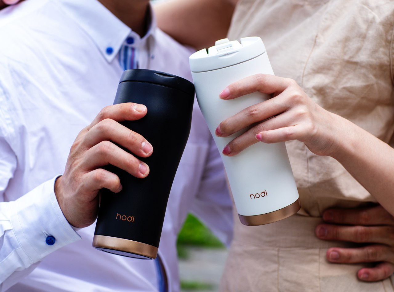 This ceramic tumbler with a removable glass cup retains your drinks  original taste - Yanko Design