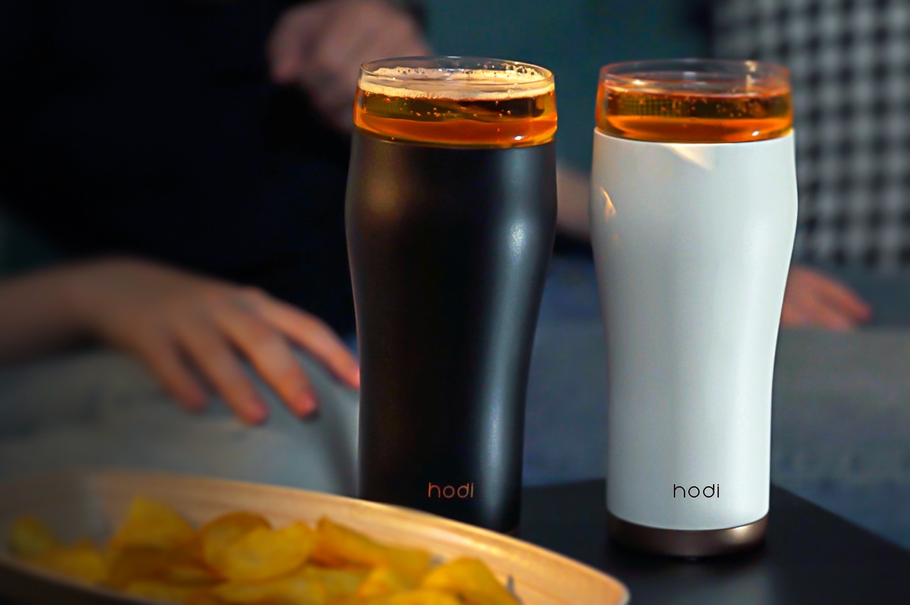 This travel thermos with its own detachable beer mug is proof that