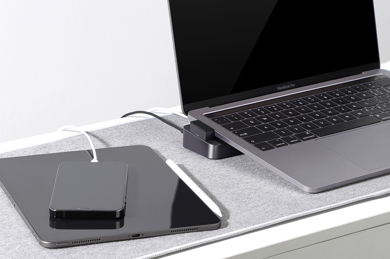 This tiny cubic USB-C hub doubles as a laptop stand, effectively cooling  and charging your MacBook Pro! - Yanko Design