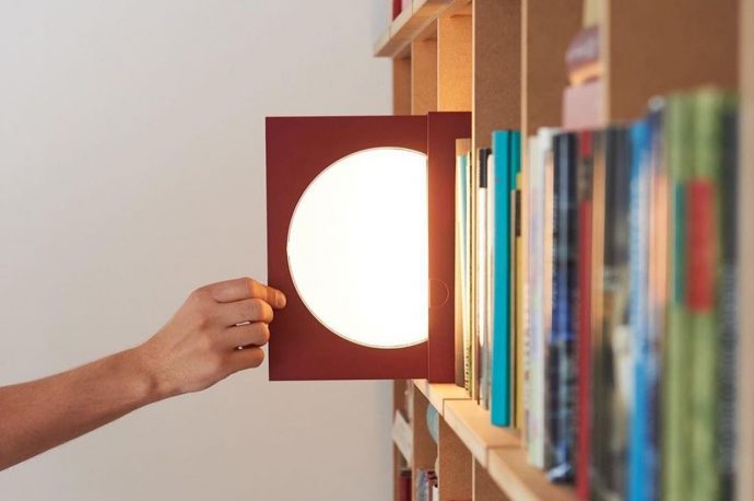 Slide the circular Elina light out of its cover to illuminate your home. Watch the video!