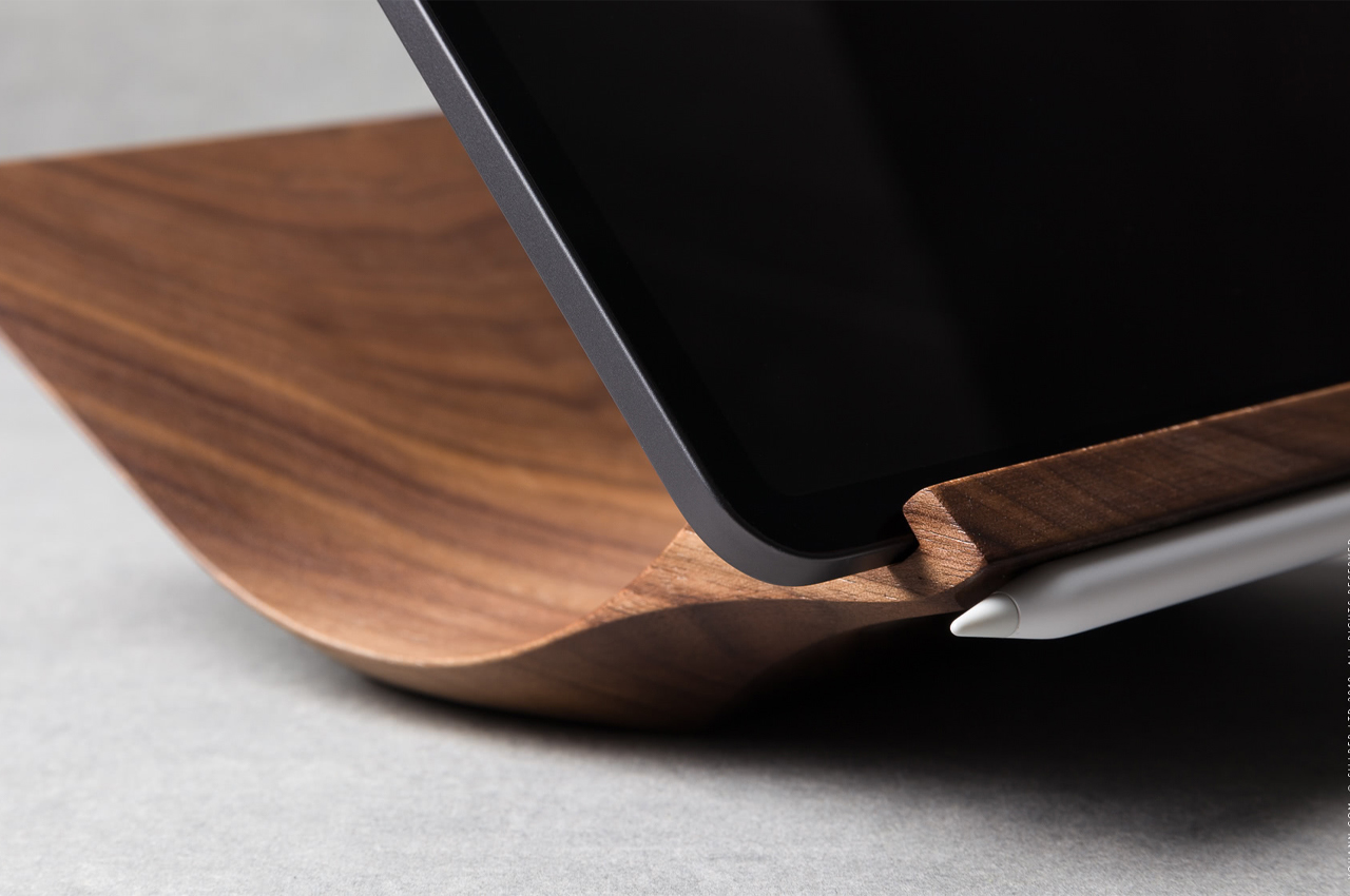This handcrafted iPad Pro Stand carved from a single piece of wood