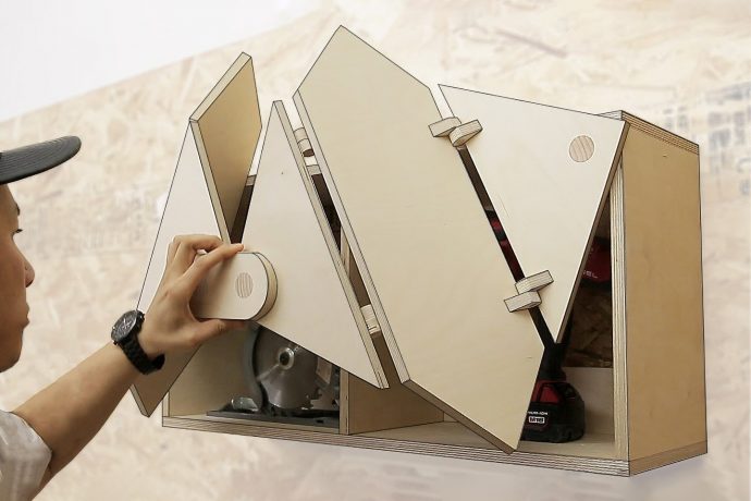 This multi-hinge kinetic cabinet-door opens in the most unusual style!